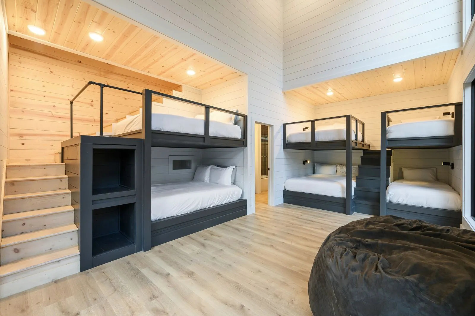 Bunk room at The Arcadia with queen and single beds