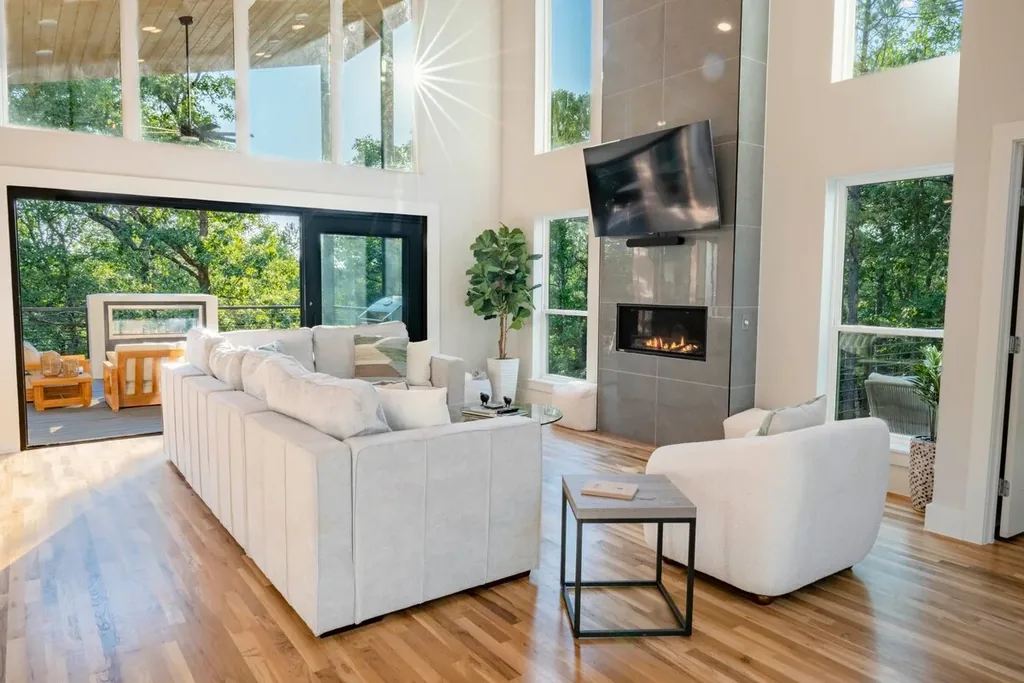 Living room seating and fireplace at The Aroha