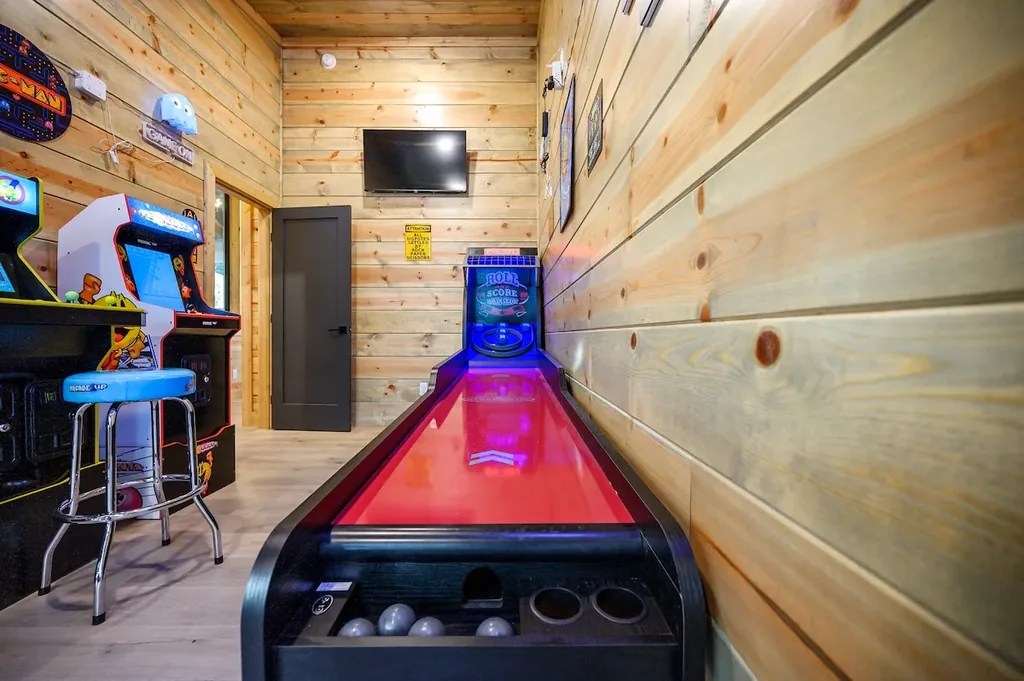 Skee-ball lane and arcade games in the game room