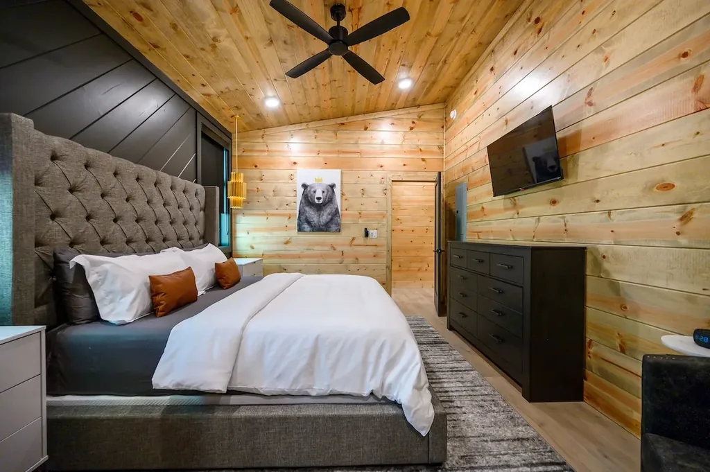 King Bedroom 3 with television and bear artwork