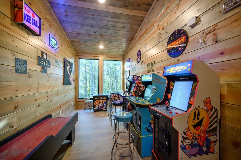 Game room lined with classic arcade cabinets