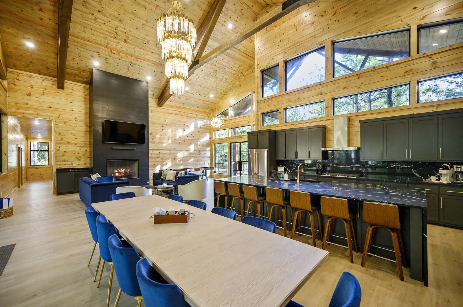 Dining hall and island under the chandelier at The Avalon