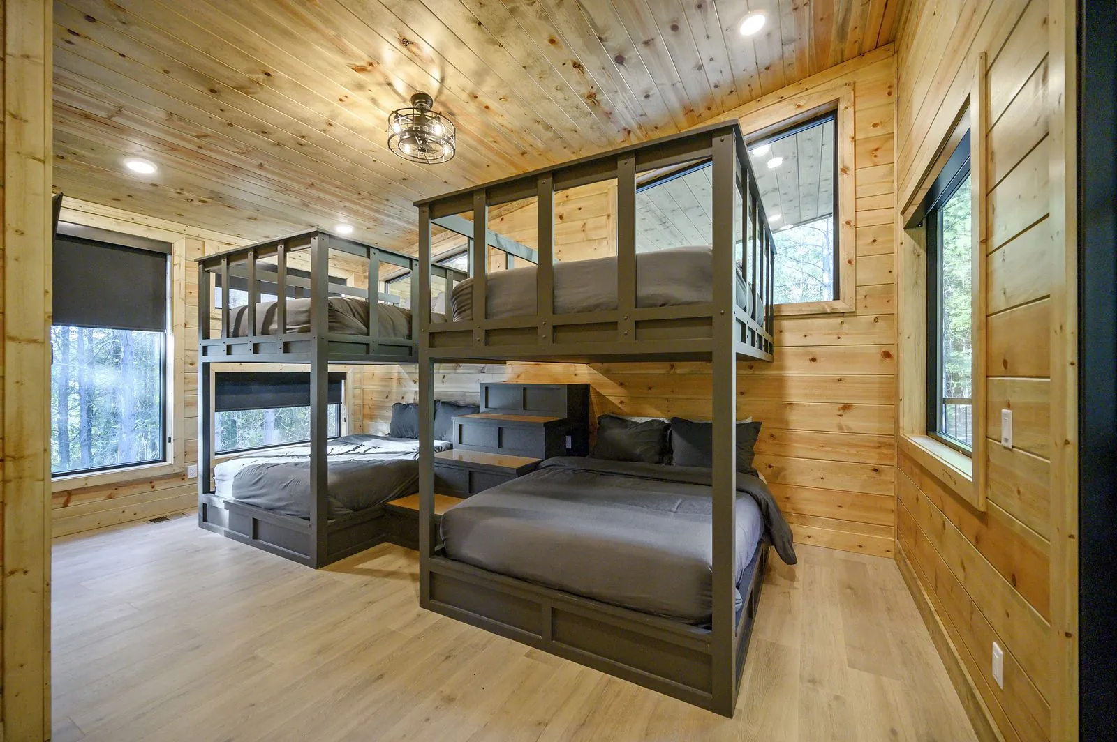Bunk room at The Avalon with two queen-over-queen bunk beds