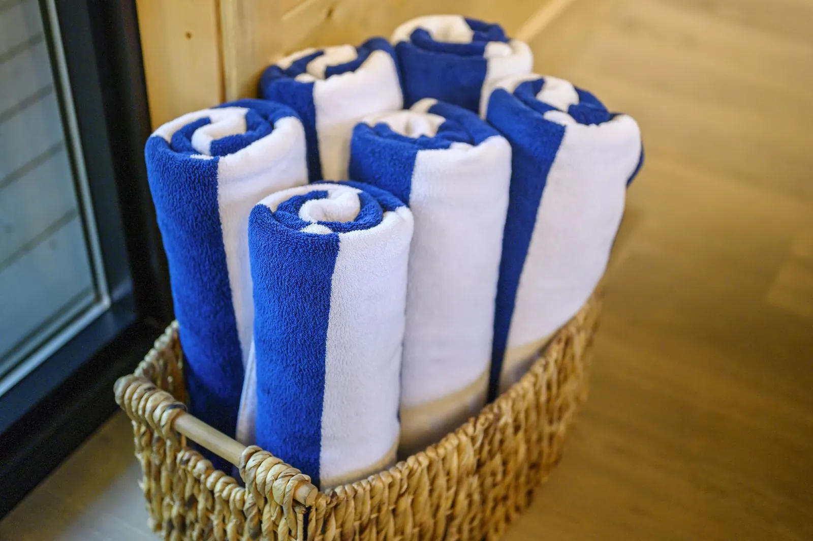 Premium bath amenity bottles with body wash, conditioner, and shampoo at The Avalon