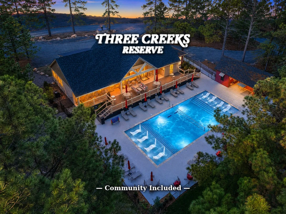 Three Creeks Reserve resort pool and clubhouse across the street from The Black-Beary pet-friendly cabin