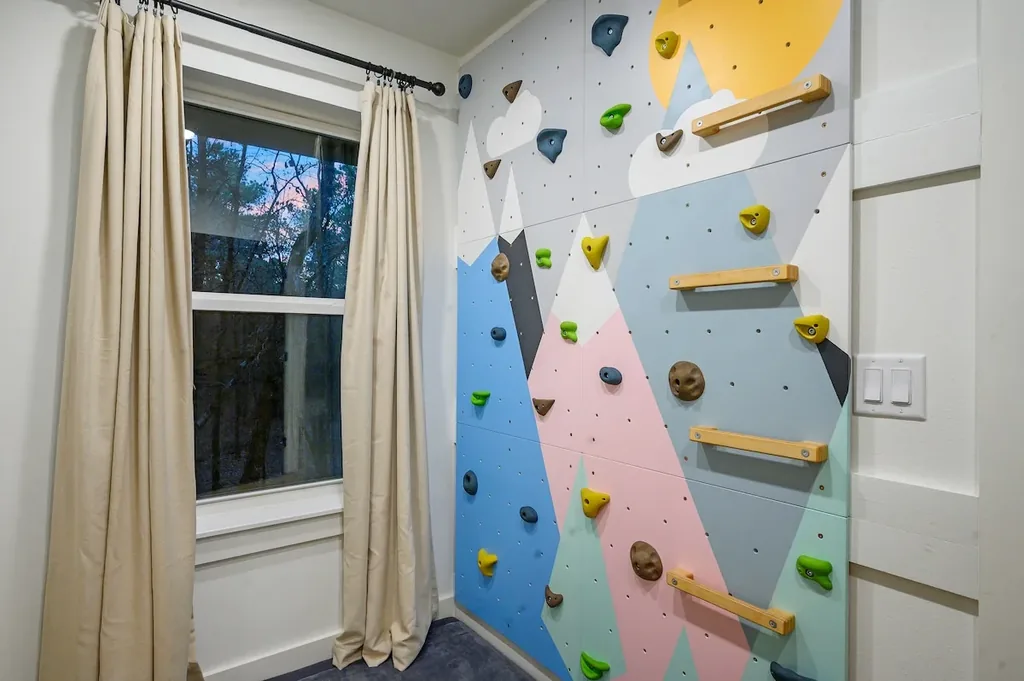 The Black-Beary — Kids and adults alike can climb a private in-room rock wall decorated with a colorful mountain scene.