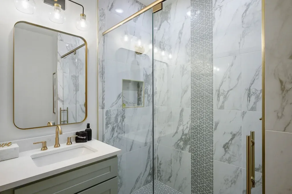 Walk-in shower in full bathroom 1