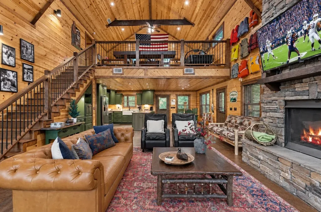 Open-concept living room and staircase at Cami's Campout