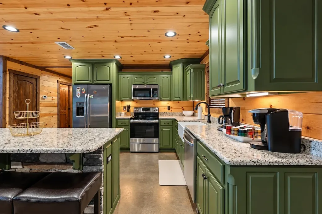 Full green-cabinet kitchen at Cami's Campout