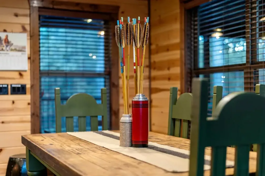Dining area at Cami's Campout beneath the cabin windows