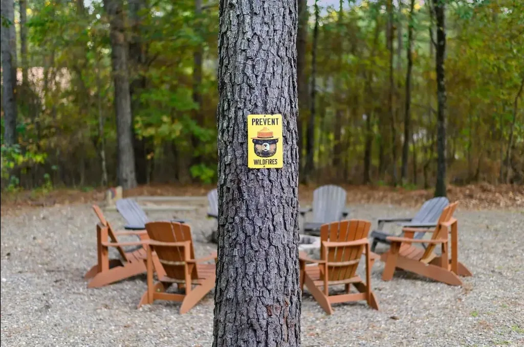 Fire pit gathering area in the Cami's Campout backyard