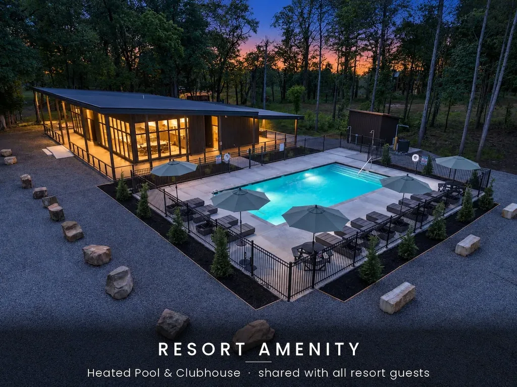 Clearwater's private pool and outdoor fire lounge at night