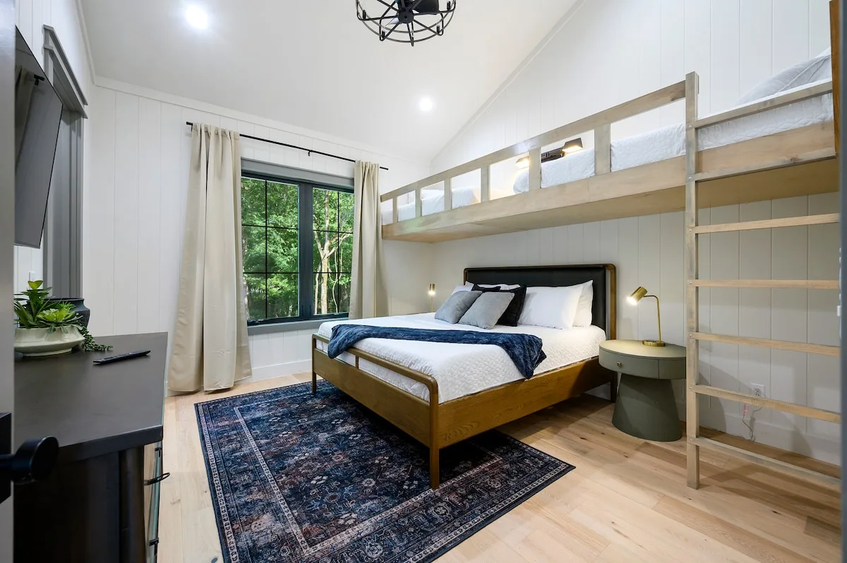Upstairs family suite at Clearwater with one king bed and two single beds