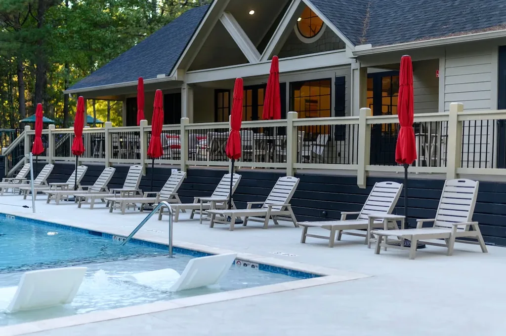 Dolce Far Nient — Spend the afternoon poolside on a lounge chair with the shared resort pool and clubhouse just steps away, included at no extra cost.