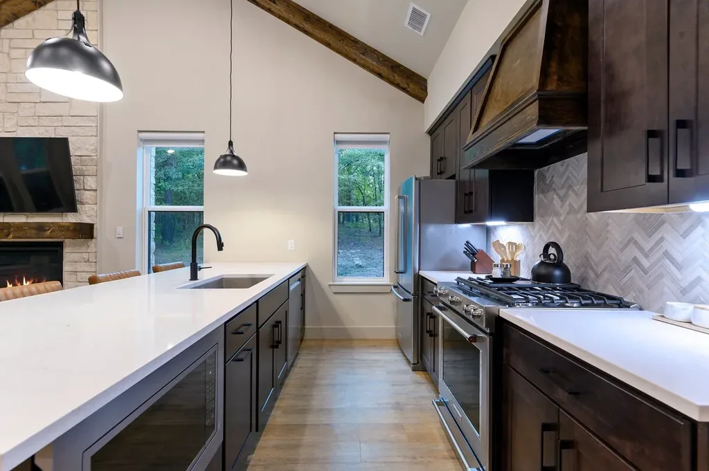 Dolce Far Nient — Cook a full meal on the gas range and stainless appliances while guests gather around the oversized island.
