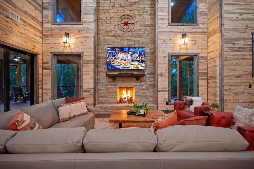 Great room fireplace and television at Dreams & Streams