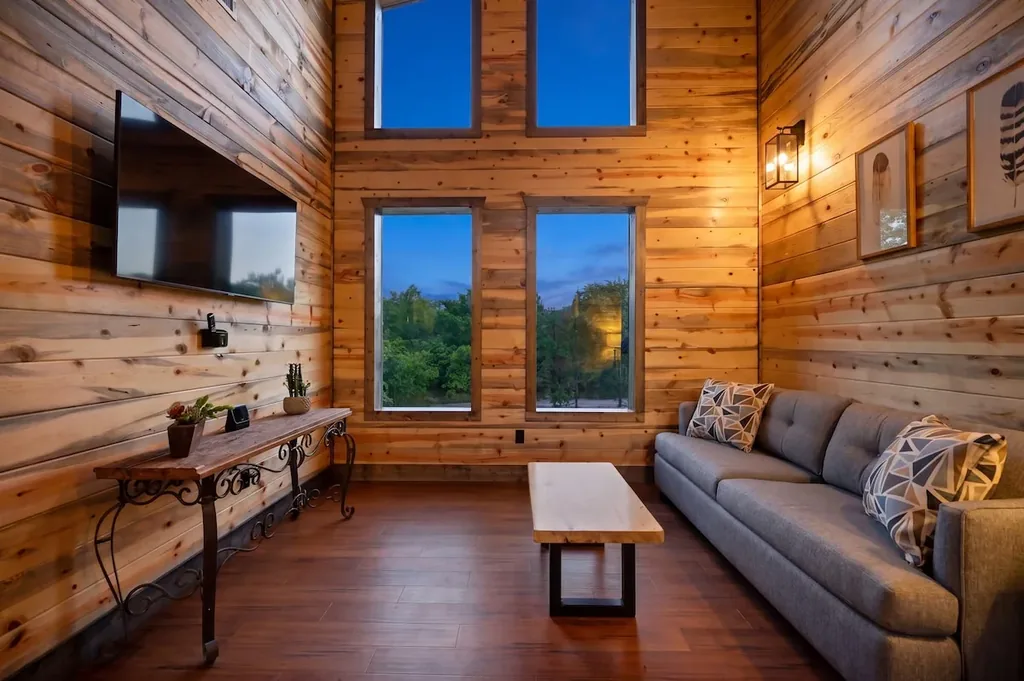 Upstairs television loft with sofa bed at Dreams & Streams