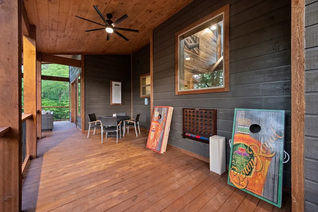 Covered deck with cornhole and giant Connect Four