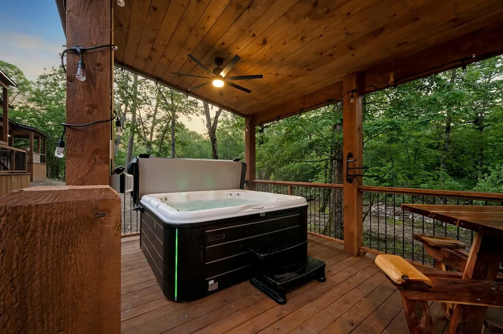 Covered hot tub viewed from the deck seating area