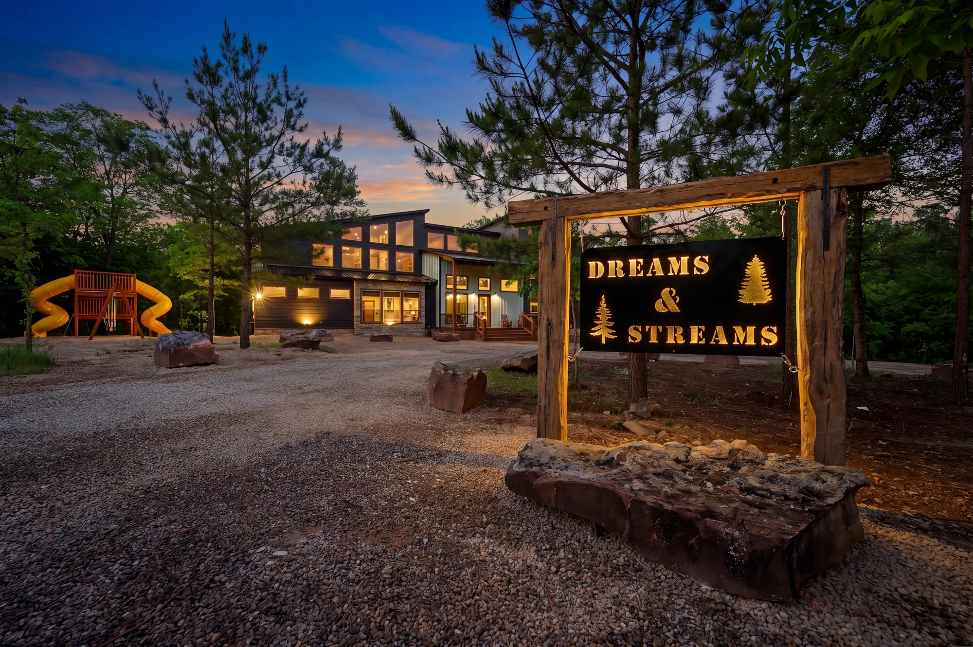 Front exterior of Dreams and Streams creekside cabin in Hochatown