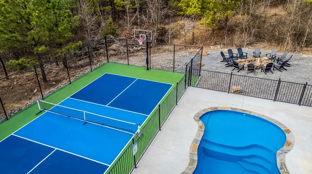 Private pickleball and basketball court beside The Jade's pool