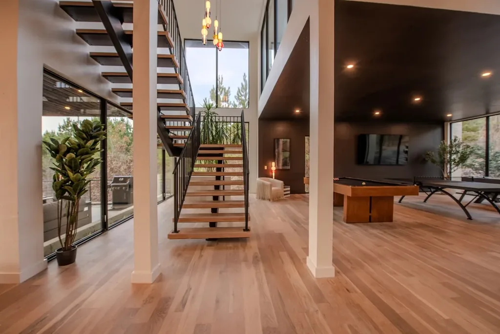 Staircase connecting The Jade living room and game room