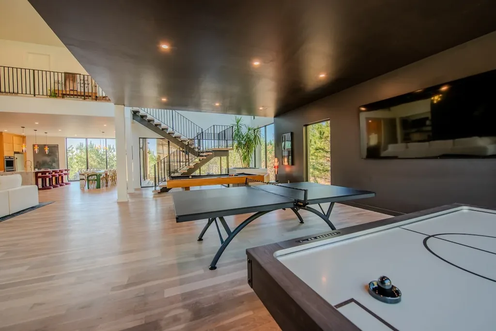 Wide view of The Jade game room with air hockey and ping-pong