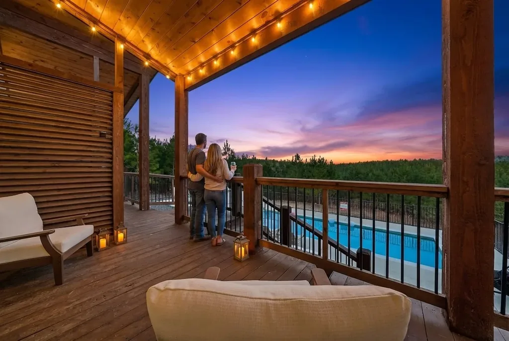 King Bedroom 4 balcony overlooking the pool at twilight