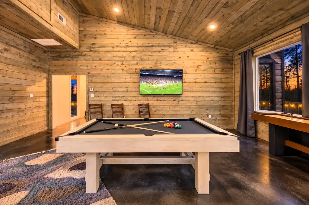 Miko Chukka — Rack a game of pool or shuffleboard in the private game room while the flat-screen TV plays in the background.